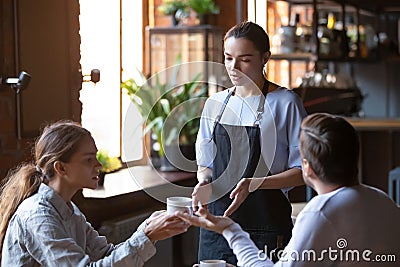 Angry client couple complain about bad service to waitress Stock Photo