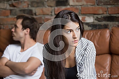 Angry couple avoiding talking after family fight Stock Photo