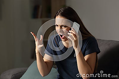 Angry customer claiming on the phone Stock Photo