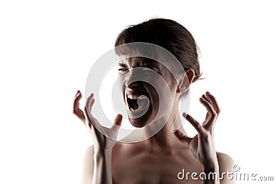 Angry cute girl, half silhouette portrait. Screaming and riising hands. Isolated on white background Stock Photo