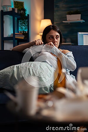 Angry frustrated woman breaking eviction notice paper Stock Photo