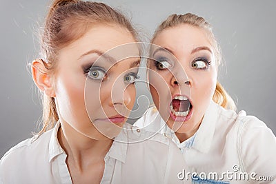 Angry fury girl screaming at her friend or younger sister Stock Photo