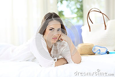 Angry hotel guest looking at you on vacations Stock Photo