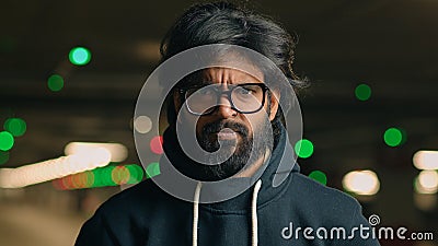 Angry Indian bearded sad upset dissatisfied man Arabian guy disappointed aggressive stressed looking at camera anger mad Stock Photo