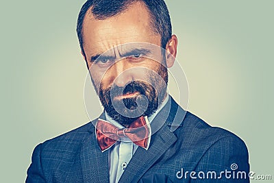 Angry man looking accusatory to you camera Stock Photo