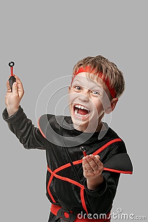 Angry ninja with kunai Stock Photo