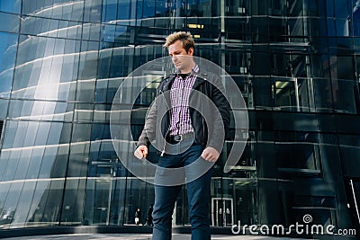 Angry sports man, the manager swears at his client. Clenched his fists with indignation Stock Photo