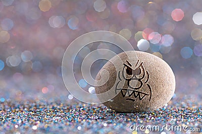 The angry stone emoji Stock Photo