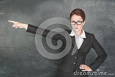 Angry teacher pointing out Stock Photo