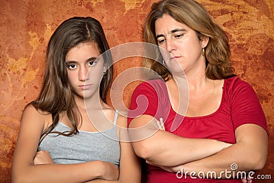 Angry teenage girl and her worried mother Stock Photo