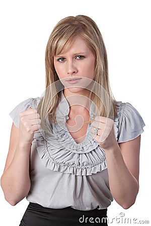 Angry woman with clenched fists Stock Photo