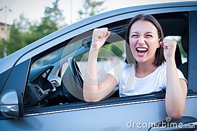 Portrait displeased angry pissed off aggressive woman driving car Stock Photo