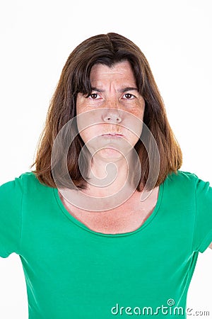 Angry woman portrait middle aged standing on white background Stock Photo