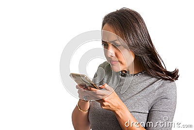 Angry woman texting on her cellphone isolated Stock Photo