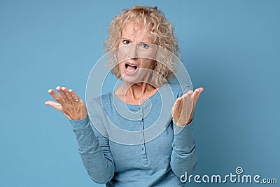 Angry woman unhappy, annoyed by something. Negaative facial human emotion. Stock Photo