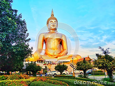 The largest sitting Buddha image in Thailand at the Wat Muang Editorial Stock Photo