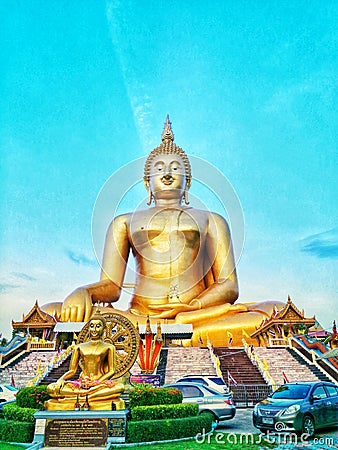 The largest sitting Buddha image in Thailand at the Wat Muang Editorial Stock Photo