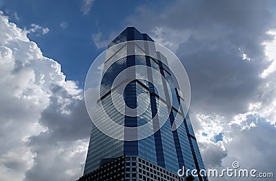 Angular geometric mirror cladding on a modern building with repeating structure Editorial Stock Photo