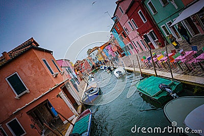 Angular view of Bruno Island's colorful houses and canal, Venice, Italy Stock Photo