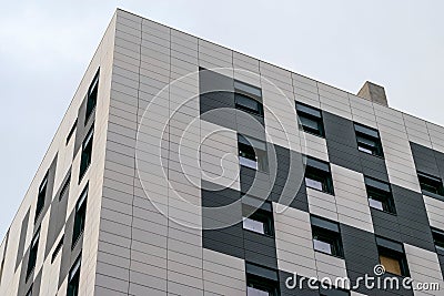 Angular view on the corner of the new modern building of apartments Stock Photo