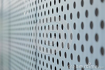 Angular view of metallic surface with round openings Stock Photo