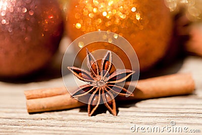 Anice cinnamon and bauble christmas decoration in gold Stock Photo