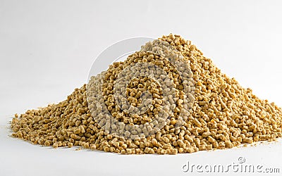 Animal feed for chicken and pig closeup with white background. Photo for feeding business and pet Stock Photo