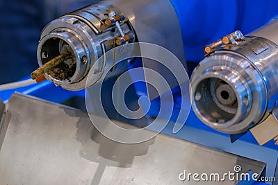 Animal food and oil extruder - feed production line at trade show - close up Stock Photo