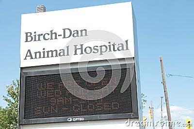 tor, canada - august 1, 2023: animal hospital front sign with electronic electric digital sign beneath. phot Editorial Stock Photo