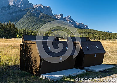 Animal proof garbage dumpsters in a park in Canmore, Alberta, Canada Stock Photo