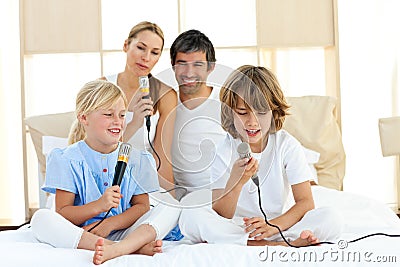 Animated family singing together Stock Photo