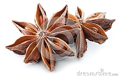 Anise star and aniseeds, spice with strong taste used in cooking, isolated on white background Stock Photo