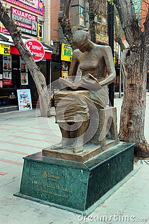 Ankara, Turkey - April 19, 2022: Human Rights Monument on Kizilay Yuksel Street, a woman reading the Universal Declaration of Editorial Stock Photo