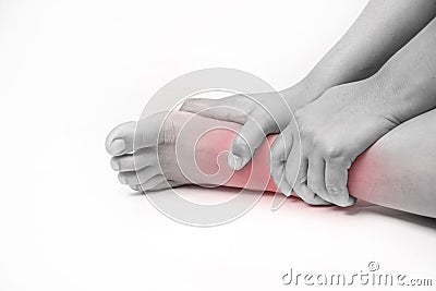 Ankle injury in humans .ankle pain,joint pains people medical, mono tone highlight at ankle Stock Photo