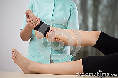 Ankle manipulation Stock Photo