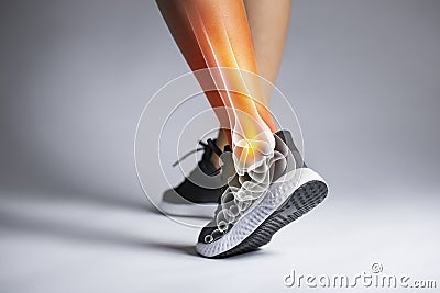 Ankle pain in detail - Sports injuries concept Stock Photo