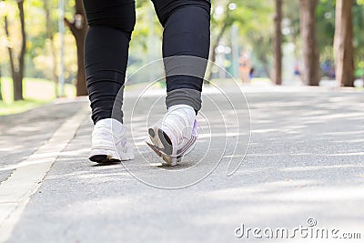 Ankle sprain while jogging Stock Photo