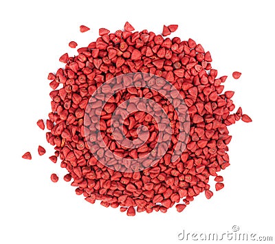 Annatto seeds, isolated on a white background. Achiote seeds, bixa orellana. Natural dye for cooking and food. Close-up Stock Photo