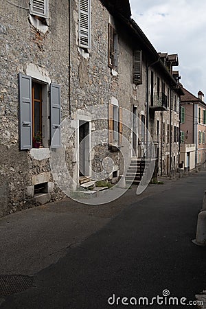 medieval french town with architectural colorful facades and arcades Editorial Stock Photo