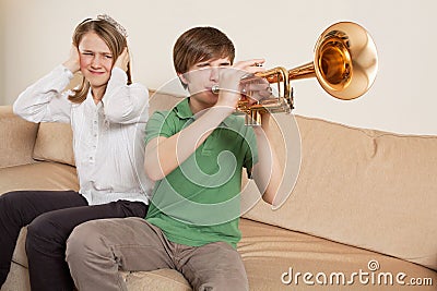 Annoying trumpet player Stock Photo