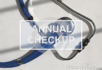 Annual checkup text on photo with sthethoscope. Health and medic care concept. Year check-up Stock Photo