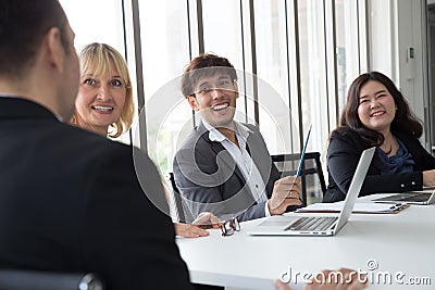 Annual sales summary meeting with manager, secretary and translator in the room office, Stock Photo