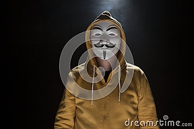 Anonymous activist hacker with mask studio shot Editorial Stock Photo