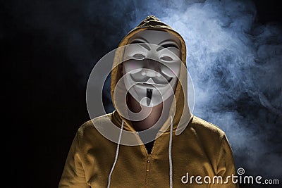 Anonymous activist hacker with mask studio shot Editorial Stock Photo