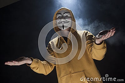 Anonymous activist hacker with mask studio shot Editorial Stock Photo