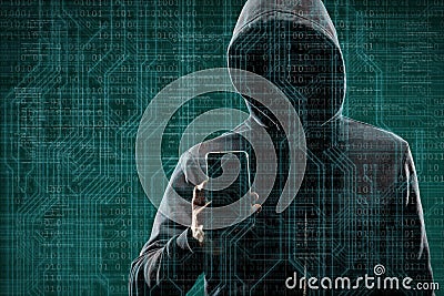 Anonymous computer hacker with a smartphone over abstract digital background. Obscured dark face in mask and hood. Data Stock Photo