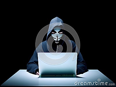 Anonymous hacker with laptop. Concept of hacking cybersecurity, cybercrime, cyberattack, etc Stock Photo
