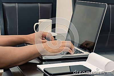 Anonymous Hands Of A Man Using His Laptop Computer Stock Photo