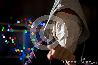 Anonymous head face in the hood maniac in dark situation f Stock Photo