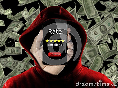 Anonymous with hoodie making fake rating and review for money concept conceptual. Untrue feedback in exchange of dollars. Business Stock Photo